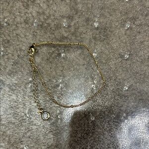 Elegant Gold Chain Bracelet with hanging stone